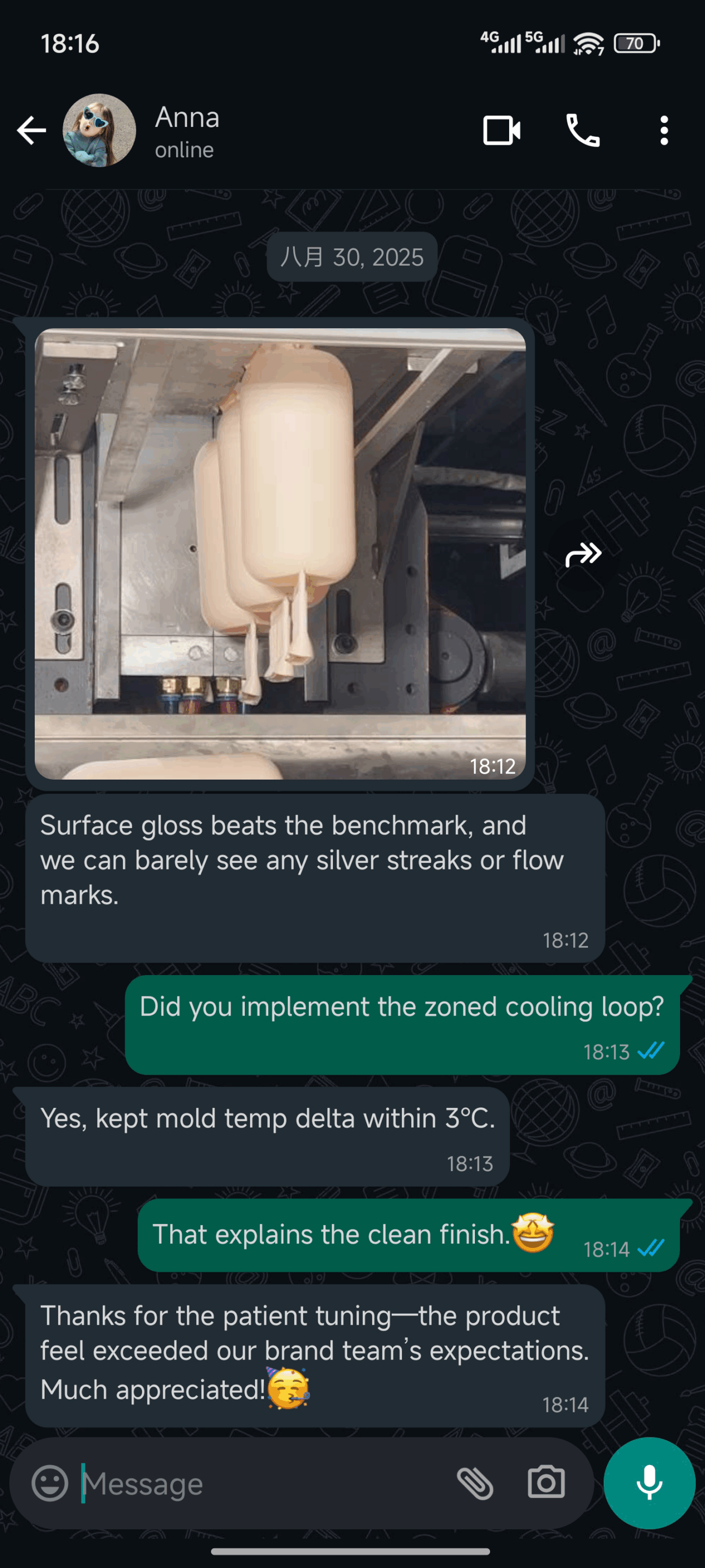 Extrusion blow mold producing two bottles with cooling fittings visible<br />
Title: Extrusion blow mold with cooling loop