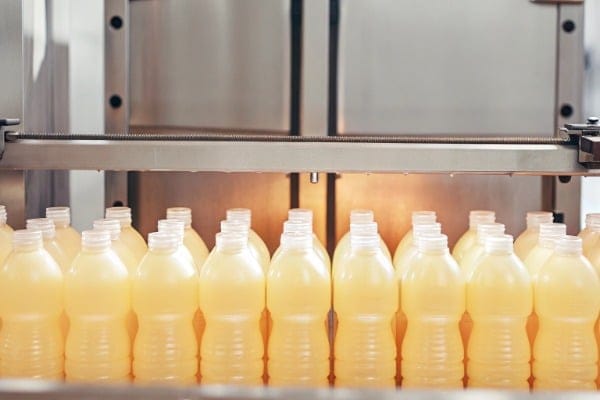 Rows of plastic bottles in production line (ID#3)