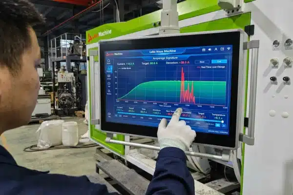 HMI touchscreen displaying real-time torque monitoring for resin consistency on electric machines (ID#3)