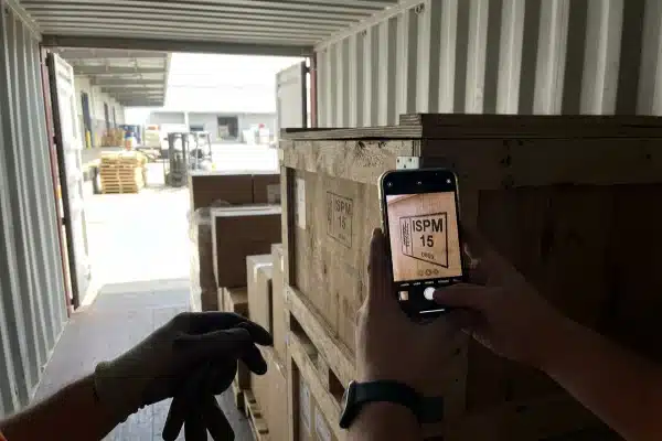 Verifying ISPM 15 Stamp Verification of ISPM 15 stamp on a shipping crate using a smartphone (ID#2)